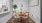a dining room table with chairs