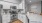 a kitchen with white cabinets