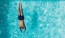 a man swimming in the water