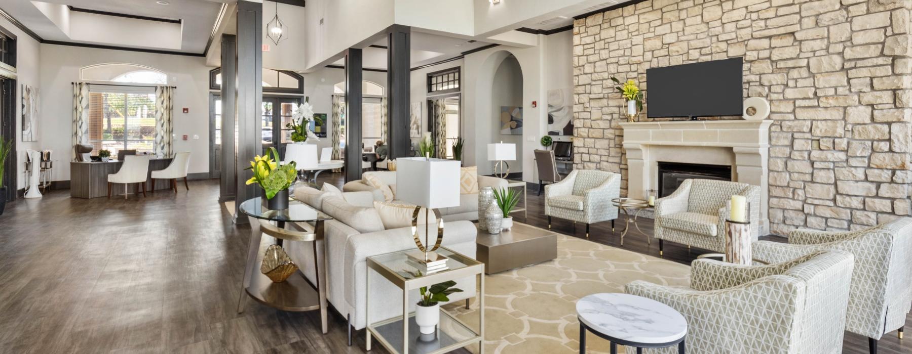 a large living room with a fireplace